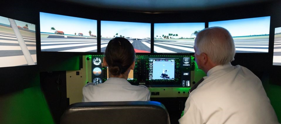 Cadet flying on a flight simulator at Wing Conference